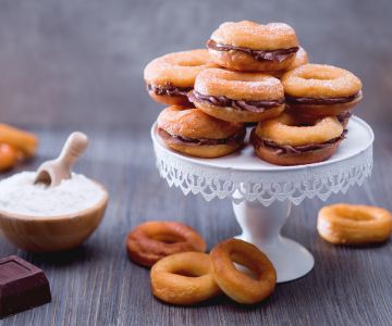 Fried Doughnuts Filled with Chocolate Cream