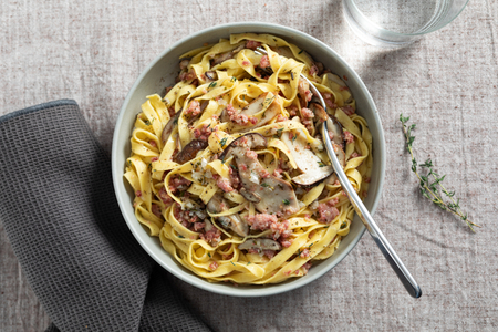 Tagliatelle with mushrooms and sausage