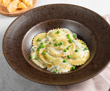 Pea ravioli with gorgonzola fondue
