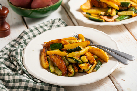 Pan-fried potatoes and zucchini