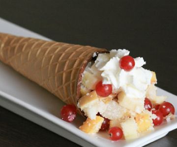 Chocolate cone filled with simple fruit salad