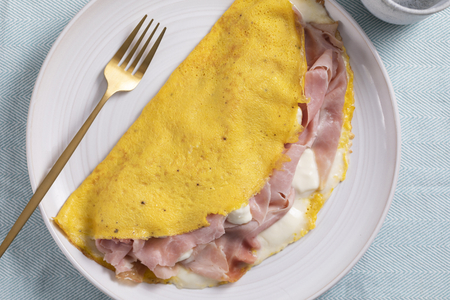 Omelette with stracchino and cooked ham