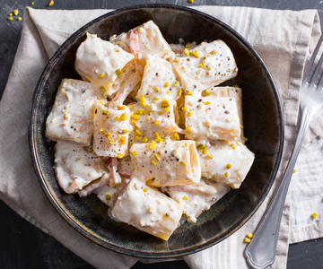 Creamy paccheri with guanciale and pistachio