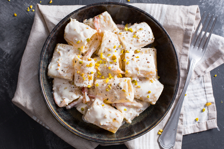 Creamy paccheri with guanciale and pistachio