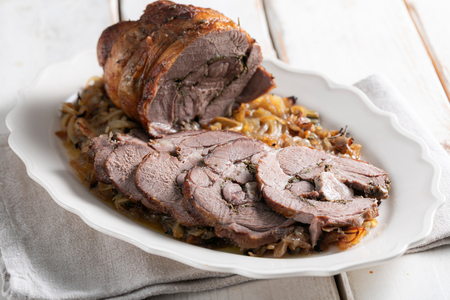 Rolled stuffed lamb
