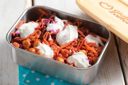 Farro bowl with spiced chickpeas, vegetables and yogurt sauce