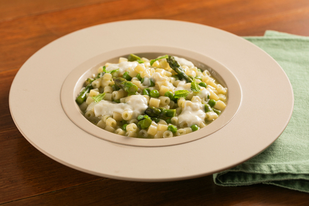 Creamy tubetti with asparagus, peas and Pecorino cheese