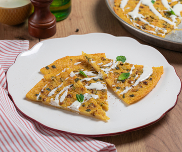 Chickpea farinata with zucchini and pecorino fondue