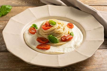 Pasta with eggplant cream and salted ricotta