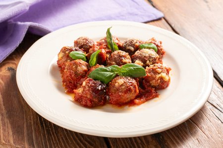 Baked meatballs in tomato sauce